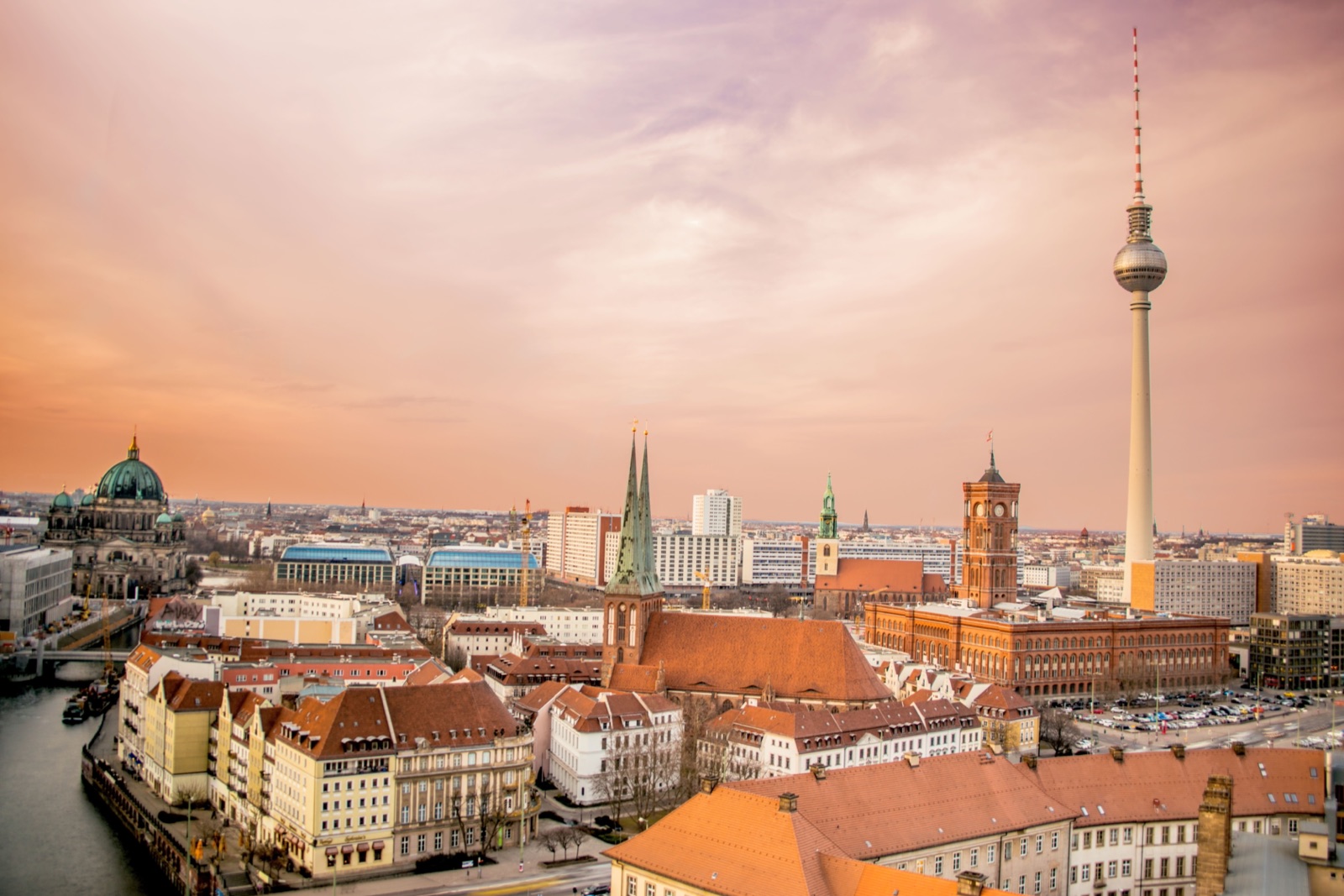 Berlin skyline at sunset with the Fernsehturm television tower and Rotes Rathaus