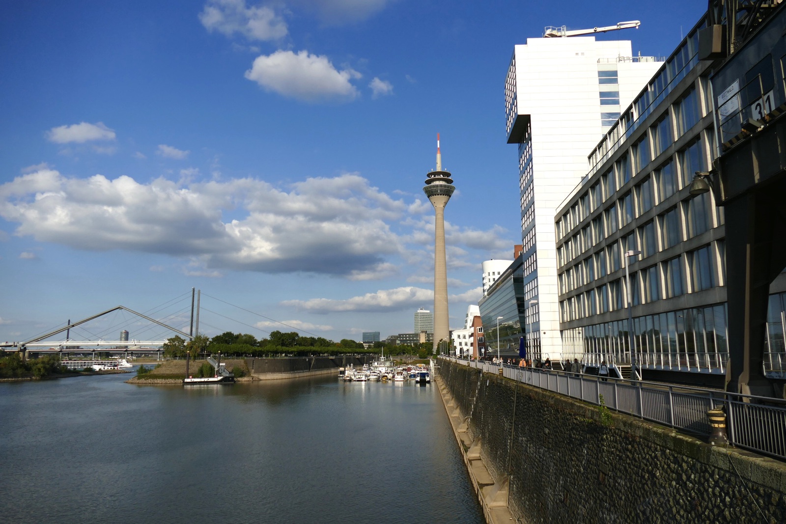 The Rheinturm tower rising over the Medienhafen harbour in Düsseldorf