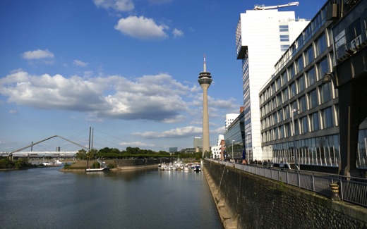 The Rheinturm tower rising over the Medienhafen harbour in Düsseldorf